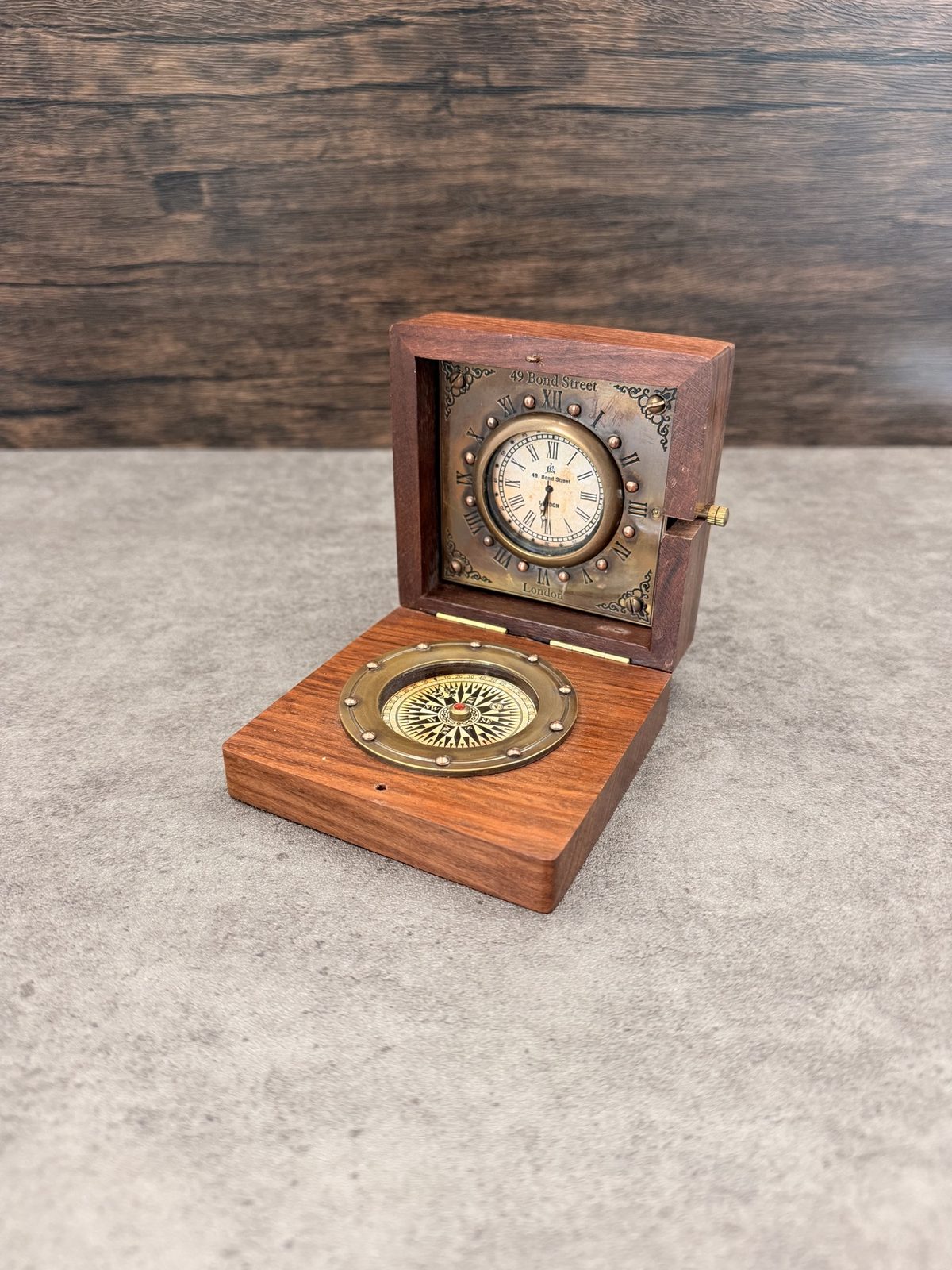 Clock and compass representing direction across markets and institutional systems
