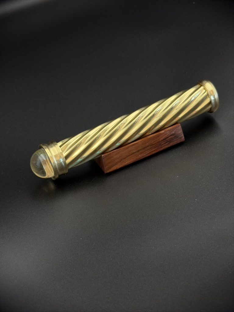 Brass teleidoscope representing a deliberate change in perspective
